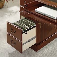 Cherry office desk serves as an attractive centerpiece for your office. Sauder Heritage Hill Executive Desk In Cherry With Black Inlay Top 402159