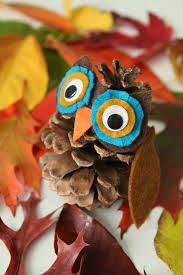 Tuto dd hibou en pomme de pin, author: 1001 Idees Pour Faire Une Creation Avec Des Pommes De Pins