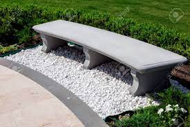Check spelling or type a new query. Stone Gray Bench Strewn With White Stone Pebbles In A Garden Stock Photo Picture And Royalty Free Image Image 126328979