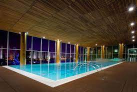 Virgin active canary riverside is set in a supreme location with waterfront views overlooking the thames. The Swimming Pool At The Virgin Active Canary Riverside Health Club Spa London Pool Rooftop Pool