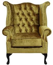 Great savings & free delivery / collection on many items. Gold Velvet Chesterfield High Back Wing Chair Designersofas4u