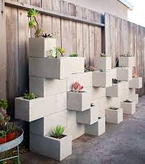 Covering a cinder block wall with surface bonding cement increases its water resistance & durability. Cinderfella S Vertical Garden Planter Urban Gardens
