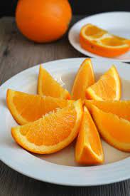 After finishing one section, turn the orange and cut off another. How To Cut An Orange Dessarts