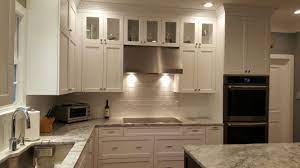 Full overlay cabinets give cabinets a more custom look. White Full Overlay Cabinetry Recessed Panel Door Style Upper Wall Cabinets Are 48 High With Either Two Doors Or Kitchen And Bath Beautiful Kitchens Kitchen