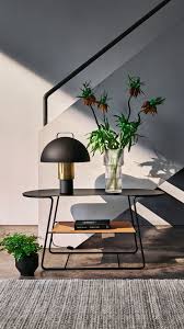 H M Home This Modern Sofa Table With A Metal Table Lamp A Large Glass Vase And A Stoneware Plant Pot Equals Interi Stylish Furniture Decor Modern Sofa Table