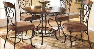 Ashley D316225 Nola Round Dining Set With Four Chairs Tubular Metal Inlaid Veneer Wood Top Kitchen Table Settings Round Dining Table Sets Kitchen Dinette Sets