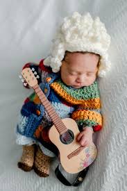 Williamson Health shared photos of newborn twins dressed as Dolly and Elvis