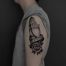 A tattoo of two praying hands, with or without a rosary and/or a cross is also a popular religious design. 37 Cool Praying Hands Tattoo Designs With Meanings Body Art Guru