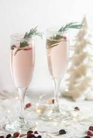 Best champagne christmas drinks from christmas pear champagne cocktail • salt & lavender. Christmas Cranberry Champagne Cocktails Seasoned Sprinkles