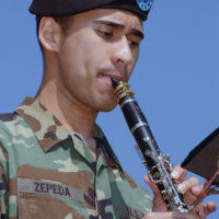 Michigan Army National Guard (MIARNG) Private First Class (PFC) Gabe  Morris, plays the Tuba in the 126th Army band at Camp Grayling, Michigan  (MI), during a practice for an annual review. (A3596) -