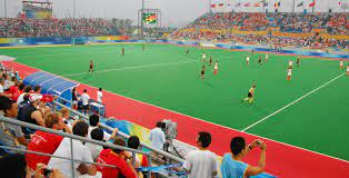 Ice hockey is a sport that is contested at the winter olympic games. Datei Olympic Green Hockey Field Jpg Wikipedia