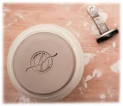 How to use personalized stamp tools for marking pottery.