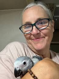 Found out our bird loves ice! Who would have thought. We made a cup of ice  and a piece had gotten stuck in the door. All of a sudden it fell on