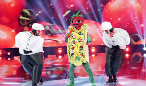 The masked singer us shocked audiences during last night's quarterfinals as jackie evancho removed the kitty mask. The Masked Singer Reveals The Identity Of The Taco Variety