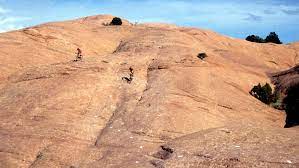 A series of petrified sand dunes has formed the trail into an 11 mile. Datei Slickrock Biketrail 1991 Jpg Wikipedia