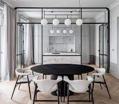 A Black Framed Glass Wall Separates The Kitchen From The Dining Room In This Apartment Interior Home Decor House Interior