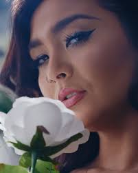 Just a few pics of @emily_juneee smelling a flower.