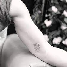 #33 minimalist heart on upper back photo: Polygonal Anatomical Heart Tattoo On The Left Inner