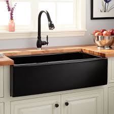 The farmhouse sink, also known as an apron front sink, was designed to be storage for large amounts of water so that people would not need to visit their water source as often. 36 Dorhester Fireclay Lightweight Rerversible Farmhouse Sink Smooth Apron Kitchen Sink Design Farmhouse Sink Kitchen Rustic Kitchen Design