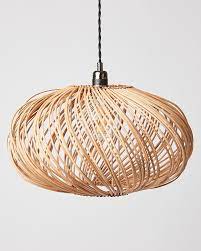 If you want to highlight a part of your décor, a ceiling track with spotlights might do the trick. Espiral Natural Rattan Pendant Lamp Shade Oliver Bonas