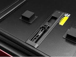 There is no reason your cargo should be damaged by harsh storms or errant debris. Rugged Liner E Series Hard Fold Tonneau Cover Realtruck