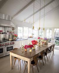 Elle Decor On Instagram A Bright And Colorful Kitchen As Seen In Designer Ireneneuwirth S Eclectic Los A Kitchen Table Lighting Kitchen Design Long Kitchen