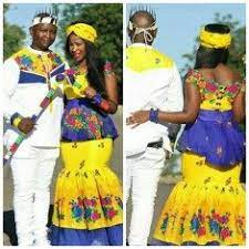 The position does not follow what is happening. Couple In Tsonga Traditional Wedding Attire African Traditional Dresses Tsonga Traditional Dresses Pedi Traditional Attire