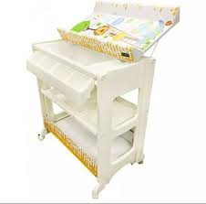 The changing table is useful for giving a soothing massage to your baby's tiny hands and feet, and changing your baby's clothes, enjoying him/her in different colorful attires besides changing diapers too. Baby Changing Table With Bathtub Babies Kids Bathing Changing Bathtub Bath Accessories On Carousell