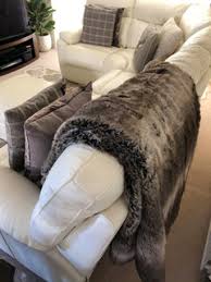 Before describing each product in the review, keep in mind that all throw pillow covers are made of faux leather and come without the inserts. How To Arrange A Faux Fur Throw On A Cream Leather Sofa Houzz Uk