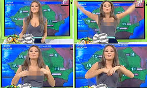 Weather presenter Roxana Vancea accidentally exposes her breasts on live TV  | Daily Mail Online