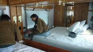 Also, when you hang a mirror in any room, make sure what it's going to reflect is pleasant to see. Rving The Usa Is Our Big Backyard Motorhome Modification Removing Mirror And Installing Vinyl Flooring On A Wall