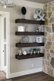Hang the shelves higher if you want to make sure your kid can't reach the shelves or down low for easy access. Diy Floating Shelves For My Living Room Shanty 2 Chic