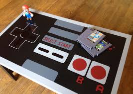 Lovingly constructed by kyle downes of ultra awesome, the table also offers ample storage for all of his other gaming systems. Nes Controller Coffee Table Greatgamergifts Com