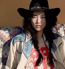 Photo postcard of a woman in traditional cowgirl attire holding a guitar. 10 Best Cowgirl Hairstyles For Trendy Women To Rock Sheideas