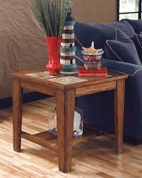 Dark oak coloured coffee table with simple yet stylish metal scrollwork. Signature Design By Ashley Toscana Square End Table T353 2 Sam S Furniture Appliance Arlington Haltom City Tx