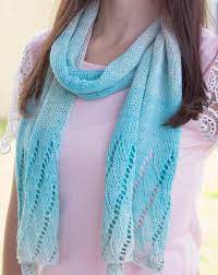 A lightweight scarf is a great accessory for any season. Knitting Pattern For Beach Scarf Lightweight Stockinette Scarf With Wavy Lace Scarf Knitting Patterns Knitting Patterns Free Scarf Sweater Knitting Tutorial