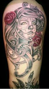 A vibrant and catchy day of the dead tattoo design on side shoulder for women. Day Of The Dead Tattoo Collection Dia De Los Muertos Design Press