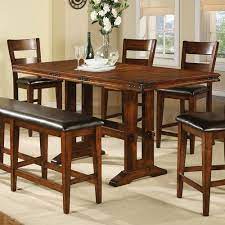 They're modern, sturdy, and above all else, quite a bit taller. Hillview Counter Height Extendable Dining Table Counter Height Dining Table Dining Table In Kitchen Tall Dining Table