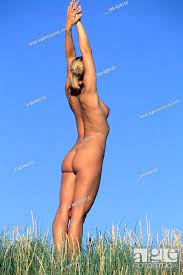Frau steht nackt am Strand - FKK - Model Released - Europa, 04/07/2007,  Stock Photo, Picture And Rights Managed Image. Pic. VIG-909151 |  agefotostock
