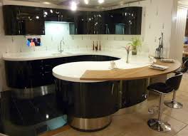 This one fits nicely at the countertop here is extended from the kitchen cabinets to form a floating peninsula breakfast bar. Ex Display Aster Cucine High Gloss Black Kitchen Breakfast Bar And Cristalan Worktops