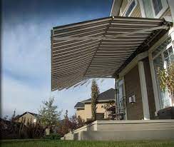 Retractable Awnings With The Marcesa Feature Offer Much Higher Headroom To Open Up Your Outdoor Patio Space Awning Shade Retractable Awning Outdoor Patio Space