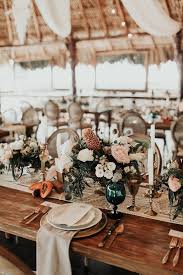 A Dreamy Rustic Boho Wedding Reception Set Up That You Could Easily Replicate With Your W Rustic Boho Wedding Wedding Reception Tables Boho Wedding Decorations