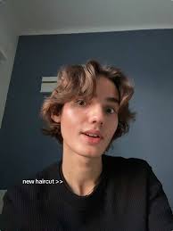 Adorable Middle Part Haircut for Men