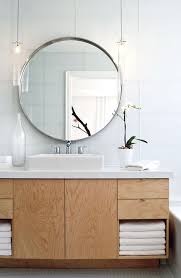 8 Fabulous Bathroom Mirrors The Interior Collective Modern Bathroom Design Bathroom Lighting Round Mirror Bathroom