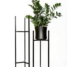Add green foliage like ferns to the outer portion of the vase. Industrial Design Handmade Metal Flower Pot Stand Ebay