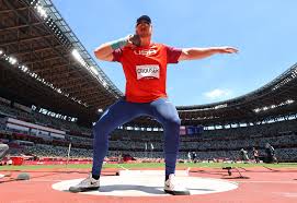The oregon native set the record during his fourth attempt, crushing the previous mark by 10. Athletics Crouser Wins Gold In Men S Shot Put Breaks Olympic Record Reuters