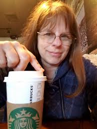 In the cafeteria chugging the coffee waiting