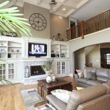 However this is my formal living room and the first thing you see when you enter the hou. Awesome Wall Decor For High Ceilings Of Vaulted Ceiling D On Large Living Room Acnn Decor
