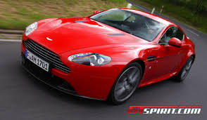 Image result for Magma Red 2012 Aston Martin