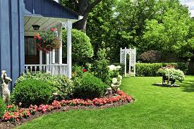 Landscape with potted plants for curb appeal. 7 Diy Curb Appeal Ideas Easy Front Yard Landscaping Tips To Try Now